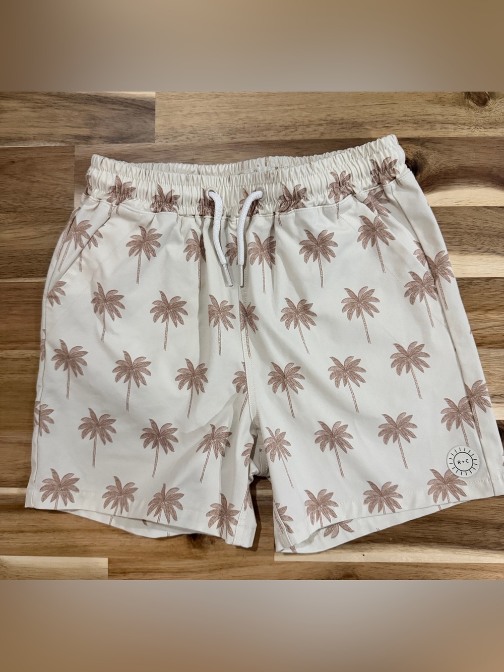 Rylee + Cru Cream Swim Trunks with Tan Palm Print size 6-7 years